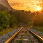 Train - brown railway during sunset