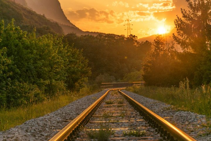 Train - brown railway during sunset