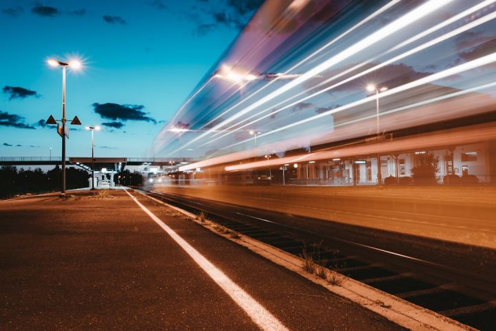 Train - well-lit street lamp during night time
