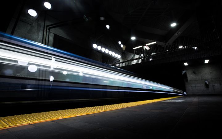 Train - timelapse photography of train passing on track