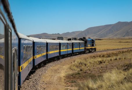Train - blue train during daytime