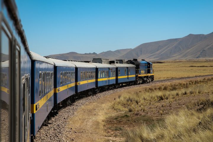 Train - blue train during daytime