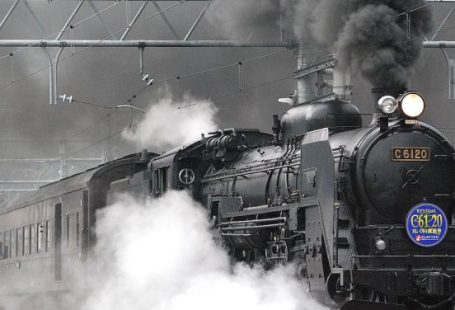 Train - Black Train on Rail and Showing Smoke
