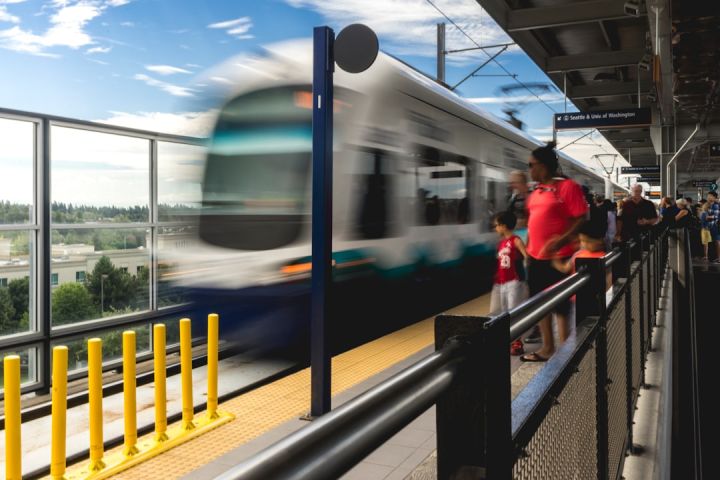 Train Ticket - people standing on platform near blue and white train during daytime