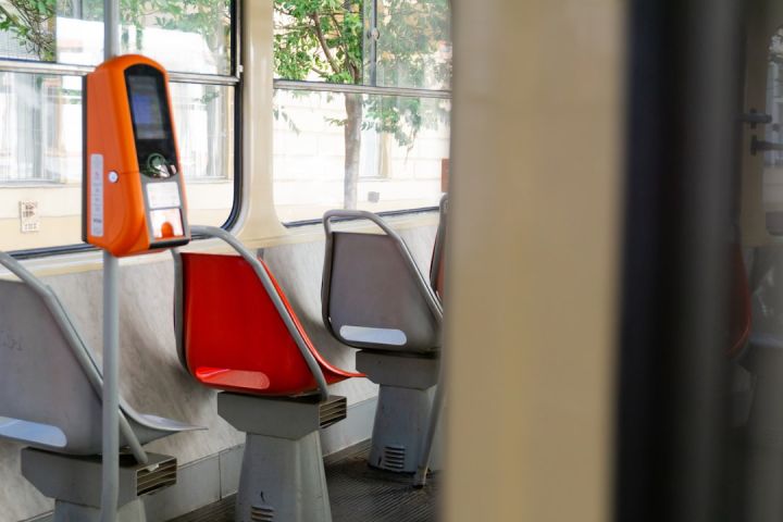 Train Ticket - red and gray bus seat