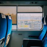 Train Ticket - blue and black bus seats