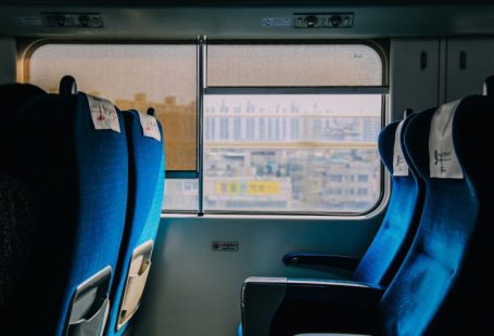 Train Ticket - blue and black bus seats