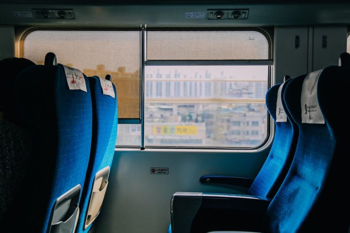 Train Ticket - blue and black bus seats