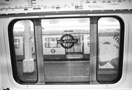 Train Ticket - grayscale photo of train with no smoking sticker