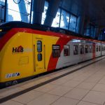 Train Ticket - yellow and red train in train station