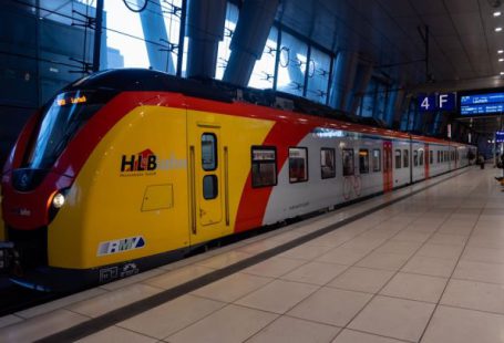Train Ticket - yellow and red train in train station