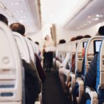 Train Ticket - shallow focus photography of people inside of passenger plane