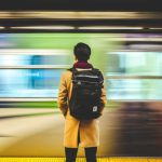 Train Station - man wearing black backpack