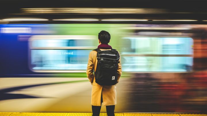 Train Station - man wearing black backpack