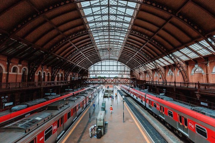 Train Station - red and white train in train station