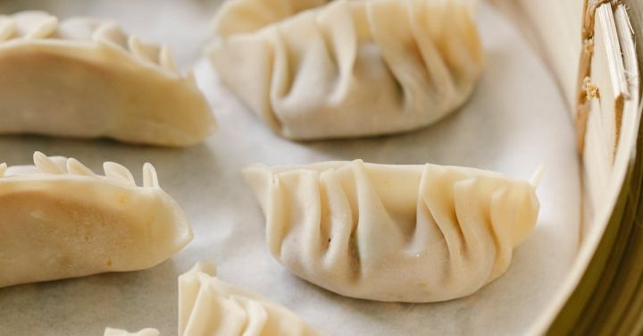 Local Cuisine - Traditional oriental dumplings in bamboo steamer