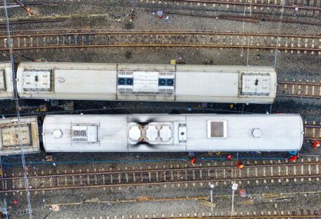 Commuter Trains - Aerial View of a Trains on Train Tracks