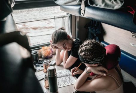 Train Ride - Woman playing Mind Games during Train Ride