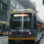 Train Crossings - Yellow and Gray Passenger Train Photo